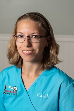 Carol in blue Moultrie Animal Clinic scrubs.